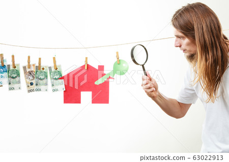 Man seller with money and house Man seller with money and house 63022913
