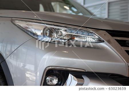 New modern vehicle with elegant head lamps. New modern vehicle with elegant head lamps. 63023639