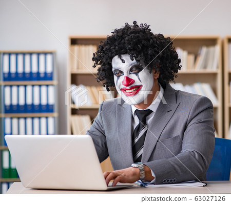 Clown businessman working in the office 63027126
