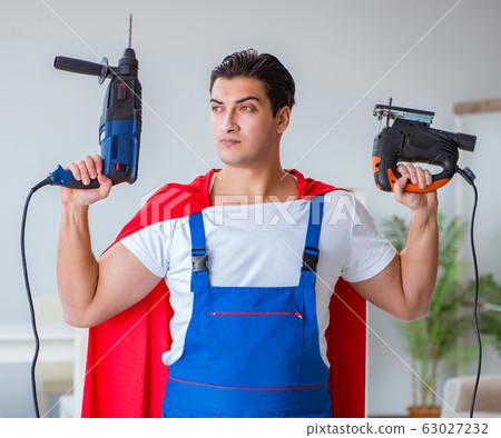 Super hero repairman working at home 63027232