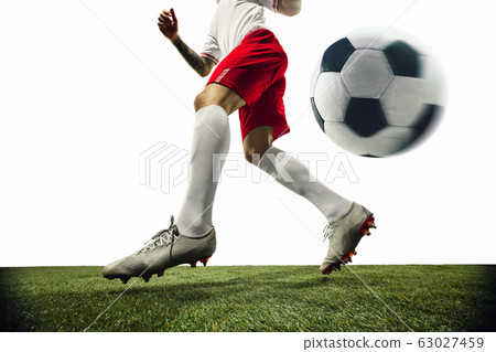 Football or soccer player on white background - motion, action, activity concept Football or soccer player on white background - motion, action, activity concept 63027459