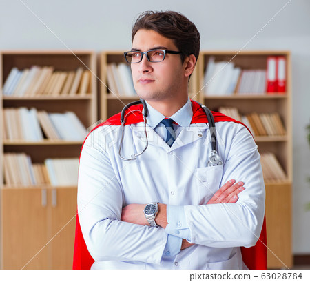 Superhero doctor working in the hospital lab 63028784