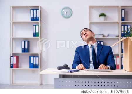 Young employee being made redundant 63029626