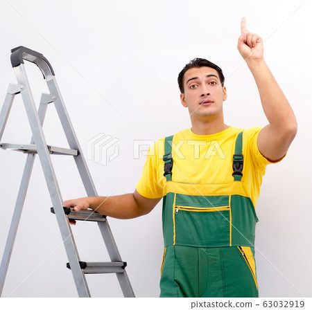 Construction worker working at the site 63032919