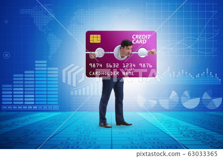 Businessman in credit card burden concept in pillory 63033365