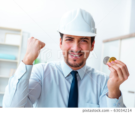 Man in bitcoin mining business concept 63034214
