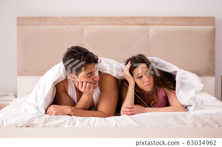 Family conflict with wife husband in bed Family conflict with wife husband in bed 63034962