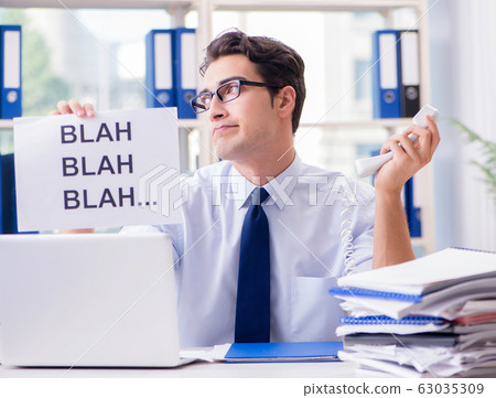 Young businessman in effective communication concept Young businessman in effective communication concept 63035309