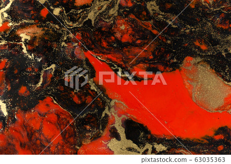 Red, black and gold paint liquid background. Abstract marble texture. Red, black and gold paint liquid background. Abstract marble texture. 63035363
