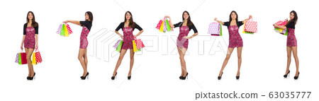 Woman with shopping bags isolated on white Woman with shopping bags isolated on white 63035777