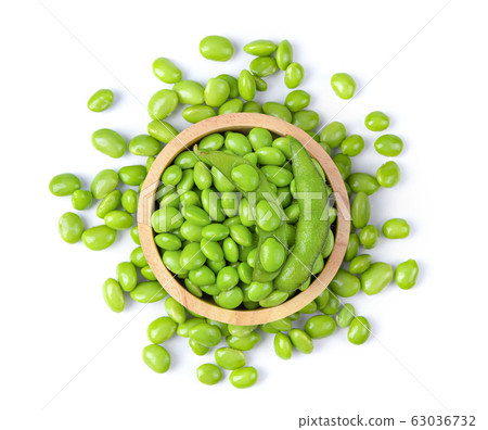 Green soy beans in wood bowl isolated on white Green soy beans in wood bowl isolated on white 63036732