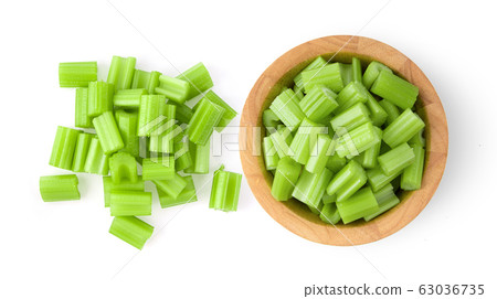 celery in wood bowl isolated on white background celery in wood bowl isolated on white background 63036735