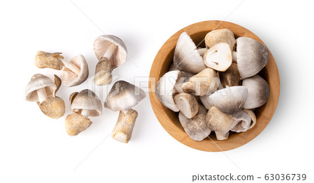 straw mushroom in wood bowl isolated on white straw mushroom in wood bowl isolated on white 63036739