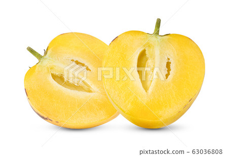 half pepino melons  on a white background 63036808