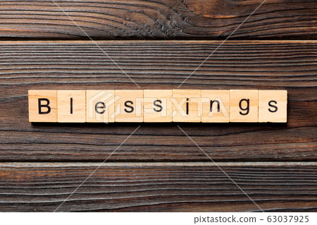Blessings word written on wood block. Blessings 63037925