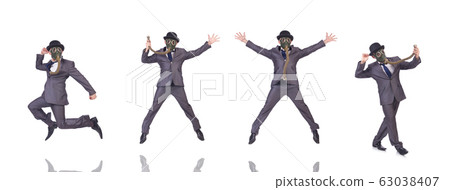 Businessman wearing gas mask isolated on white 63038407
