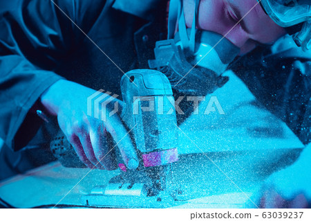 Skater in process of making his own skateboard, longboard - open business concept Skater in process of making his own skateboard, longboard - open business concept 63039237