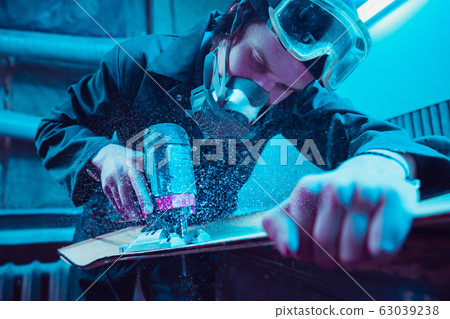 Skater in process of making his own skateboard, longboard - open business concept Skater in process of making his own skateboard, longboard - open business concept 63039238