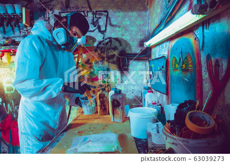 Skater in process of making his own skateboard, longboard - open business concept Skater in process of making his own skateboard, longboard - open business concept 63039273