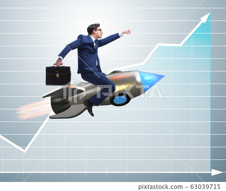 Businessman flying on rocket in business concept Businessman flying on rocket in business concept 63039715
