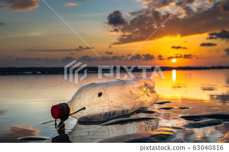 Plastic bottle on the beach. 63040816