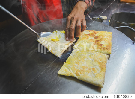 Indian street food roti sweet snack. 63040830