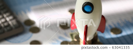 Metallic currency and rocket Metallic currency and rocket 63041335