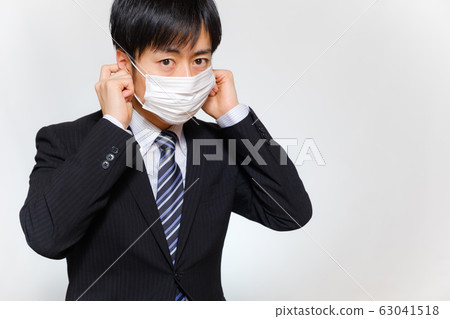 Men in suits wearing masks Infection control Cold Coronavirus Influenza 63041518