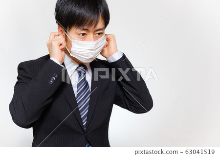 Men in suits wearing masks Infection control Cold Coronavirus Influenza 63041519