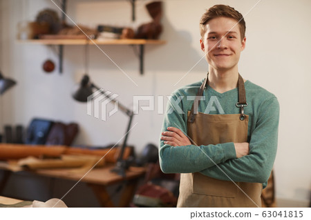 Cheerful Craftsman With Arms Crossed 63041815