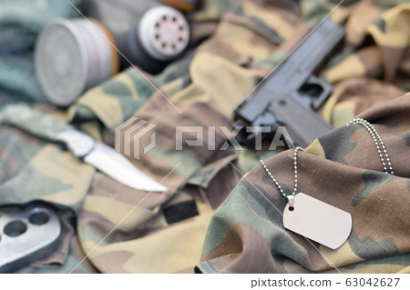 Stalker soldiers soviet gas mask lies with handgun Stalker soldiers soviet gas mask lies with handgun 63042627