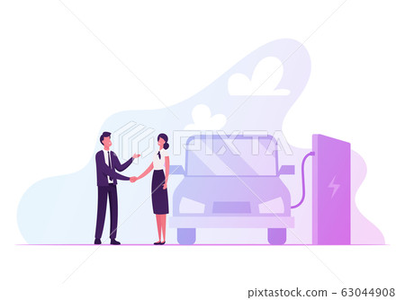Woman and Man Shaking Hands near Charging Electric Car with Lithium Battery. Eco Transport with Electricity Power 63044908