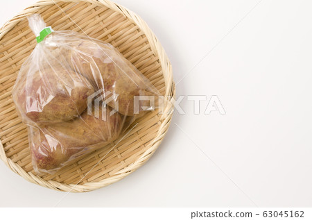 Crimson potato with soil bag Crimson potato with soil bag 63045162