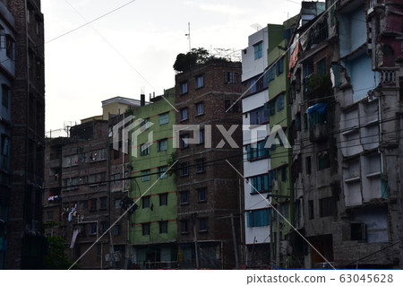 Dhaka, Bangladesh Old cityscape around Shodall Ghat-Ruined houses and scattered garbage river 63045628
