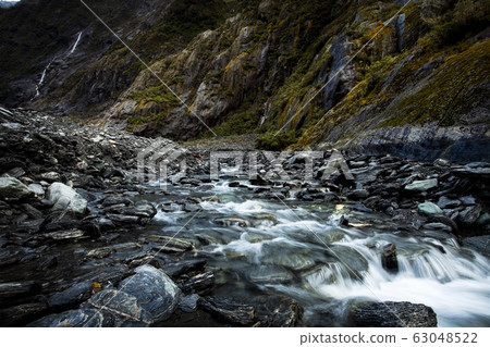 flowing creek in franz josef glacier southland new flowing creek in franz josef glacier southland new 63048522