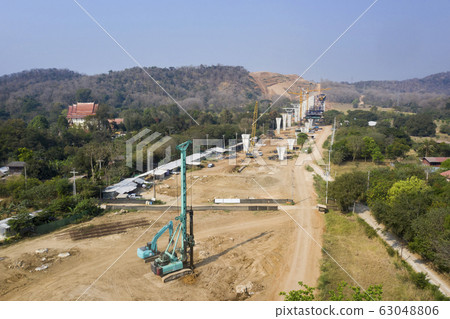 aerial view of road construction site in thailand 63048806