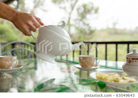 Breakfast with tea on sri lanka tea island. 63049643