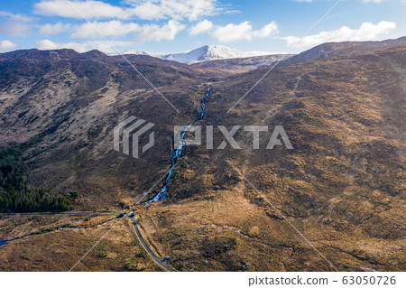 Aerial view of the Glenthornan waterfall by Dunlewey or Dunlewy in County Donegal, Ireland Aerial view of the Glenthornan waterfall by Dunlewey or Dunlewy in County Donegal, Ireland 63050726