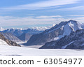 Great Aletsch glacier world heritage of Swiss and Bernese Alps and jungfrau snow mountain peak view from Jungfraujoch top of Europe with blue sky in summer background and copy space, Switzerland 63054977