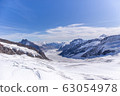Great Aletsch glacier world heritage of Swiss and Bernese Alps and jungfrau snow mountain peak view from Jungfraujoch top of Europe with blue sky in summer background and copy space, Switzerland 63054978