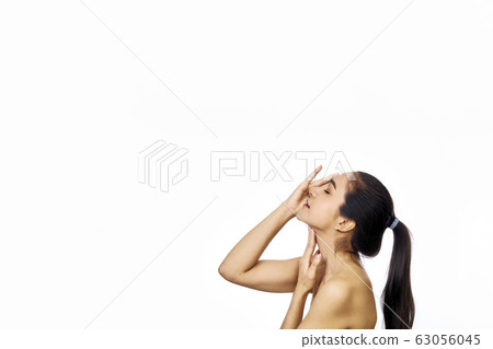 Beautiful young asian woman face with clean skin 63056045