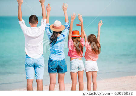 Young family on vacation have a lot of fun 63056088