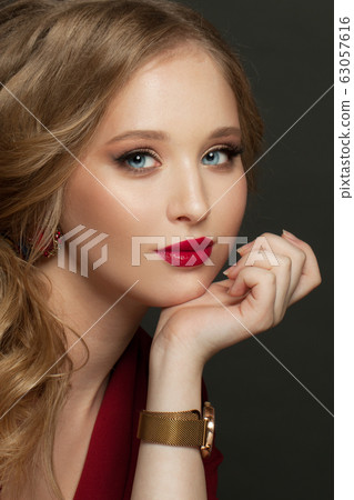 Elegant woman on black background.  63057616