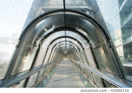 Skybridge made of glass and steel. Modern Skybridge made of glass and steel. Modern 63060338