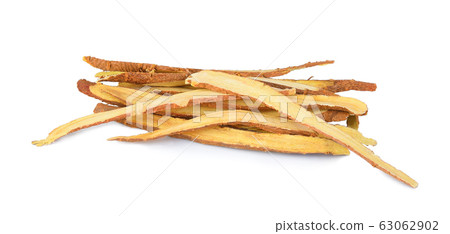 Licorice roots on white background Licorice roots on white background 63062902