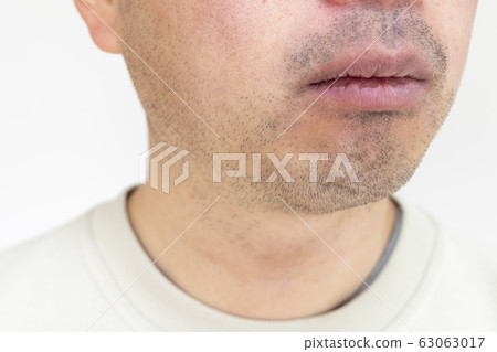 Mouth of a stubble man Mouth of a stubble man 63063017