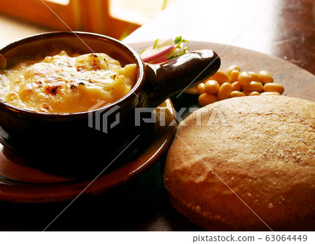 Soft French bread with gratin and whole grains 63064449