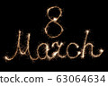 March 8 inscription with sparklers . 63064634