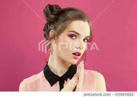 Attractive woman fashion model with trendy makeup Attractive woman fashion model with trendy makeup 63064882