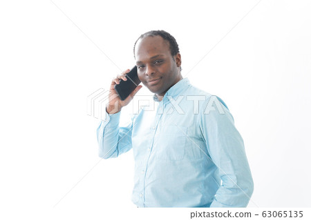 Black man using smartphone Black man using smartphone 63065135